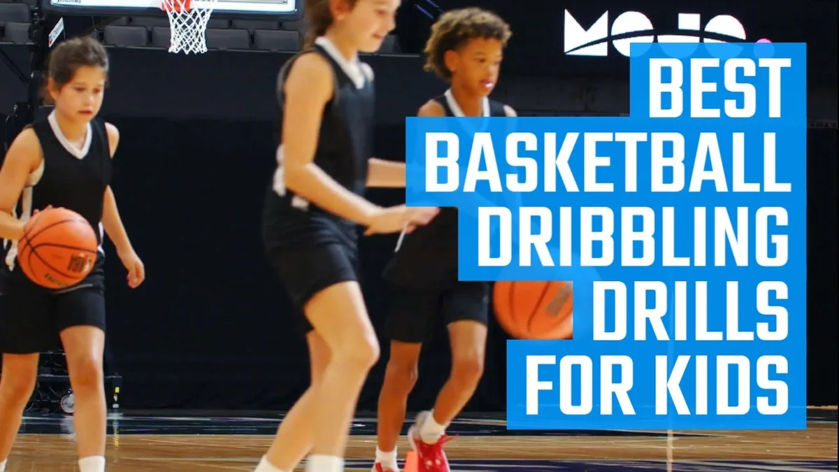 Young basketball players practicing dribbling drills